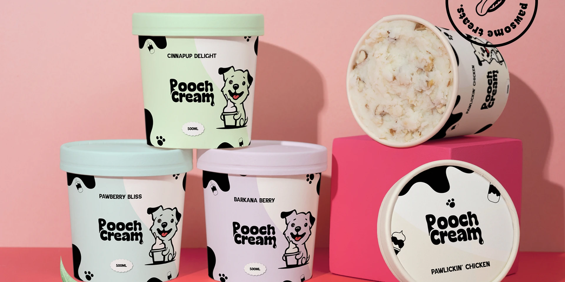 Cluster of Pooch Cream tubs showing cinnapup delight, strawberry bliss and barkana berry packaging